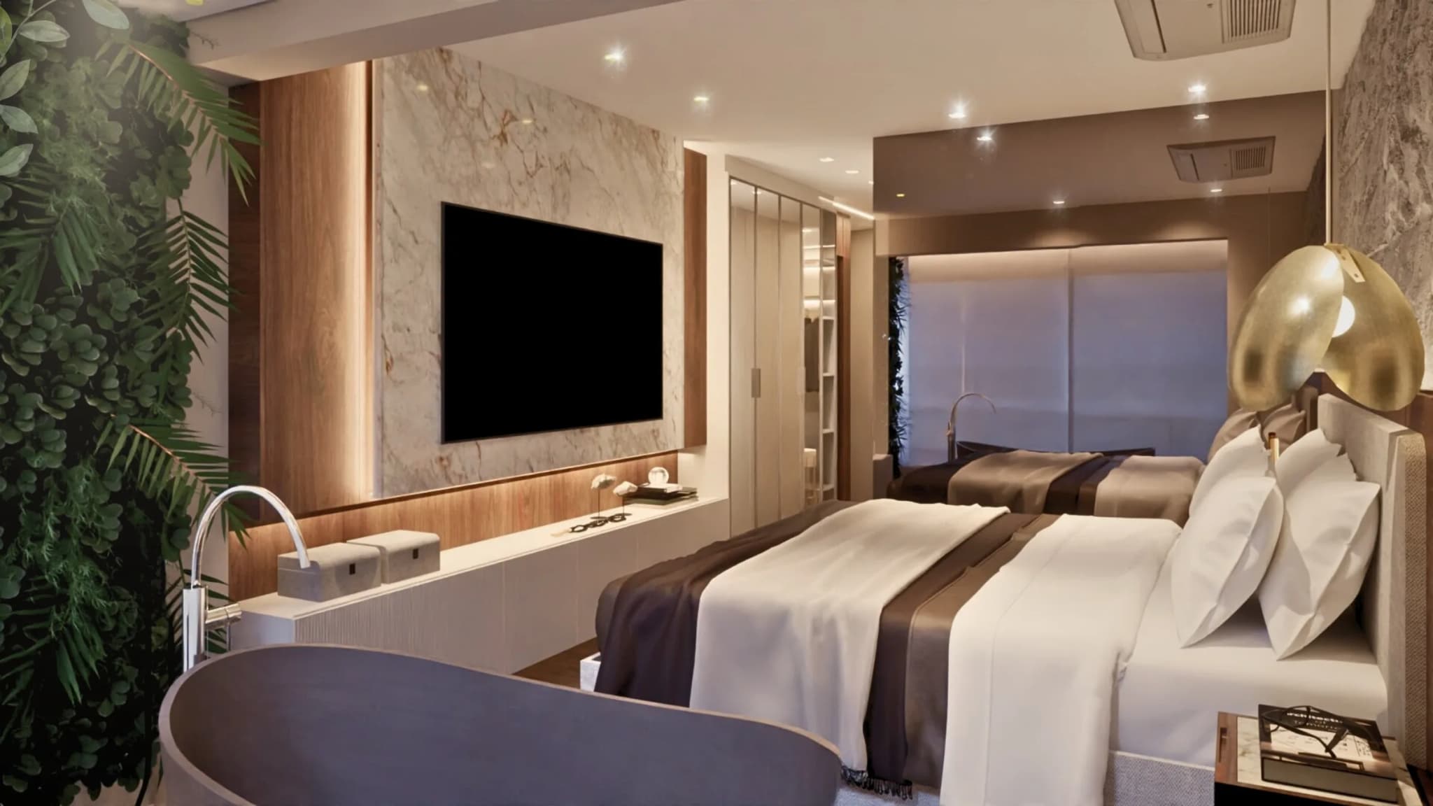 Suíte do Apê Refúgio com banheira solta, painel de mármore com TV, cama de casal e jardim vertical